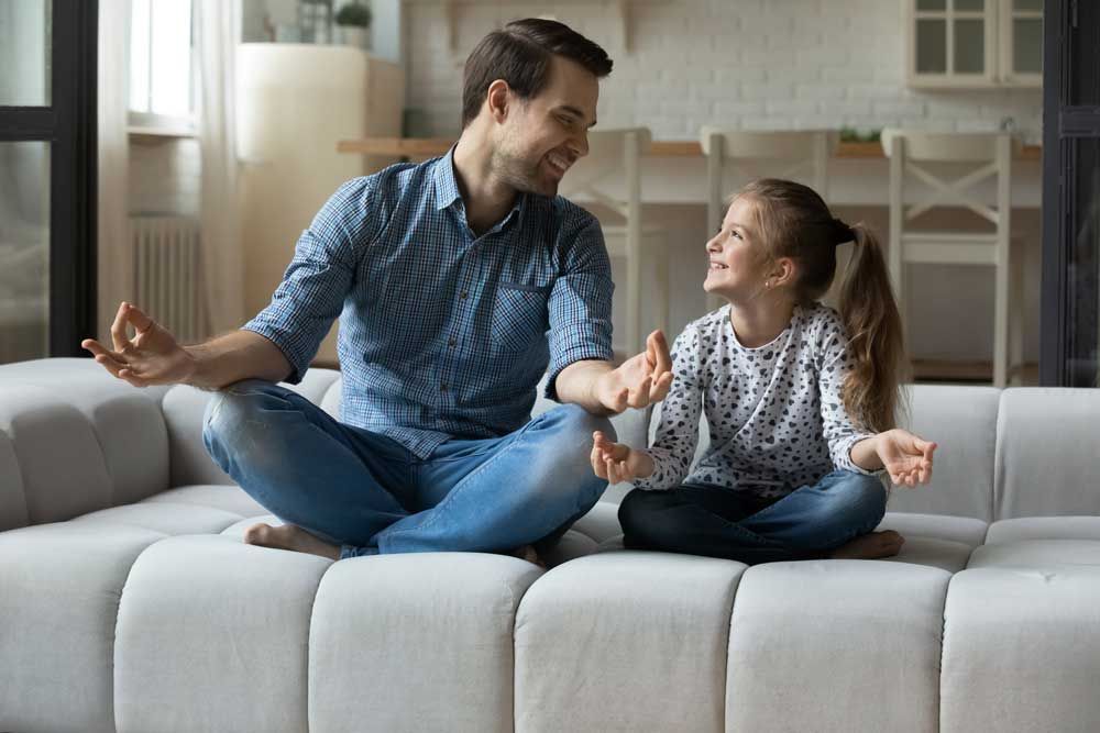 Father and daughter engaging in a PCIT coaching exercise at Family Trauma Treatment Center